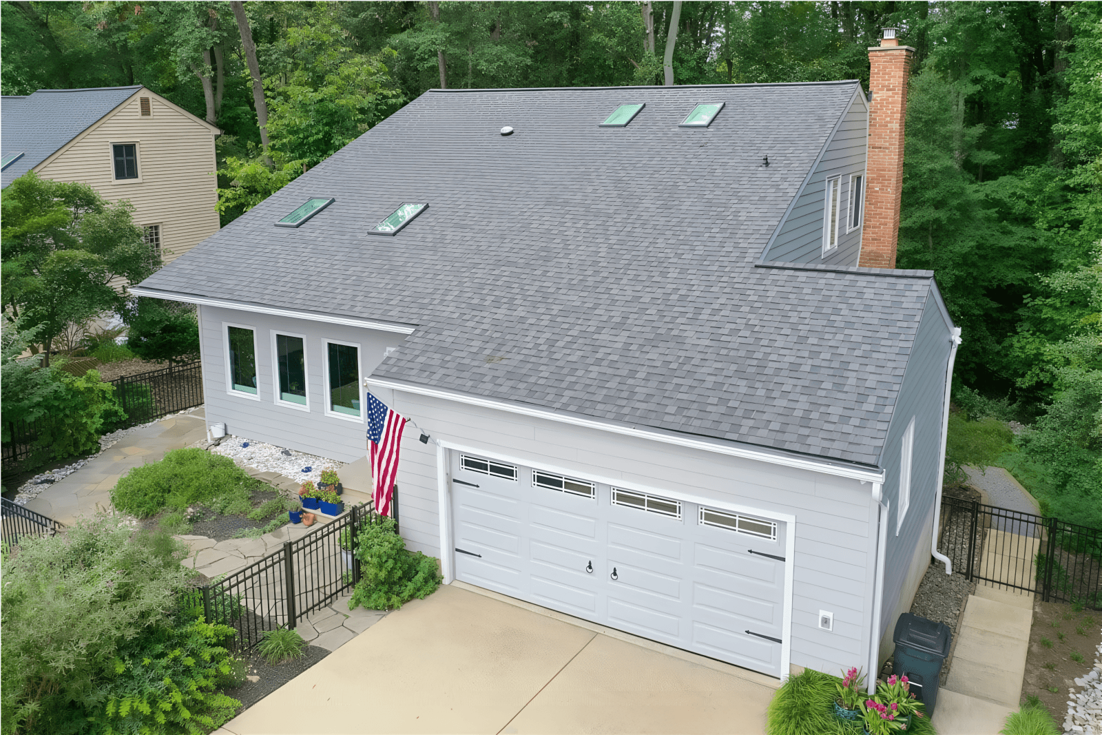 Newly replaced asphalt shingle roof on a Houston home